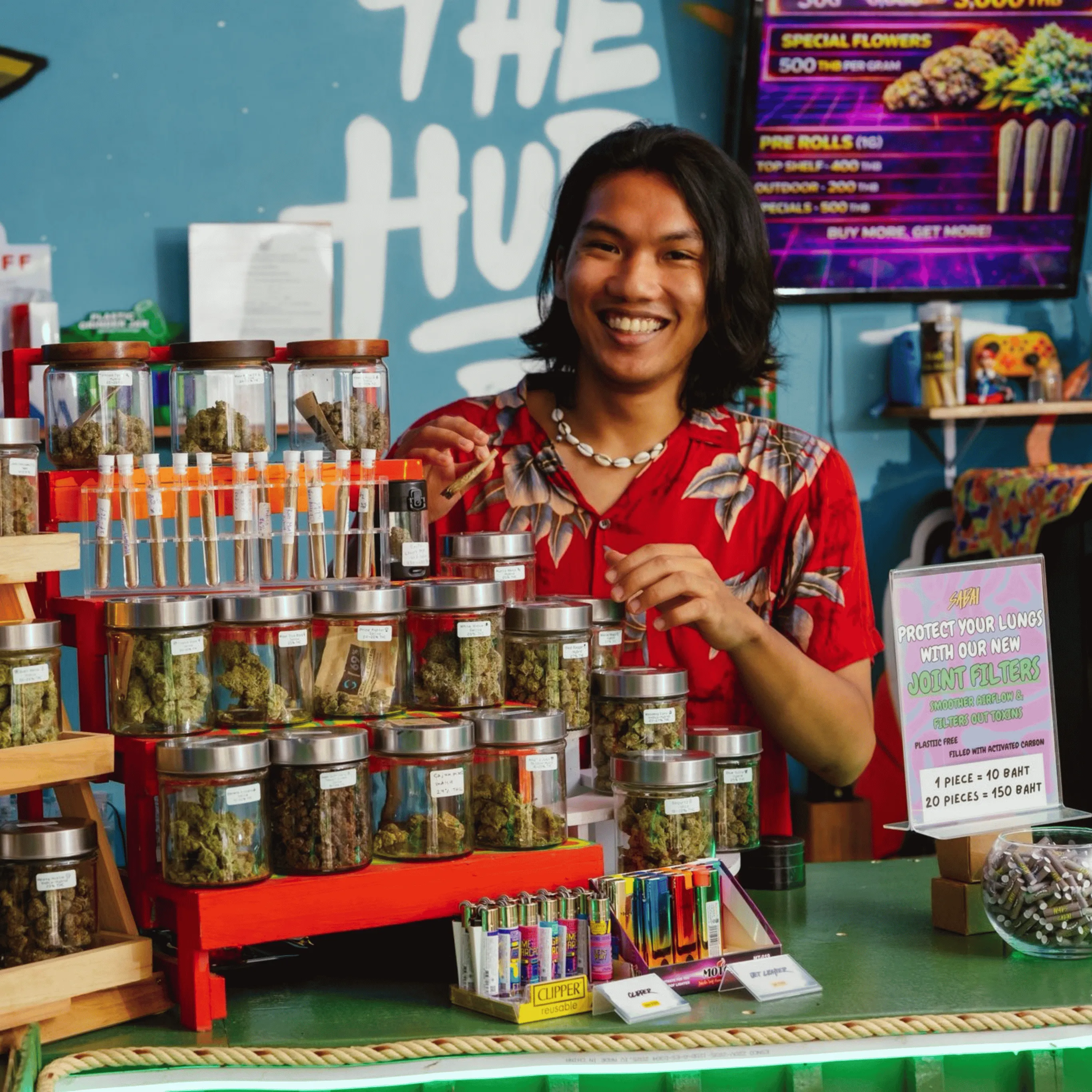 Friendly staff at The Hub display counter